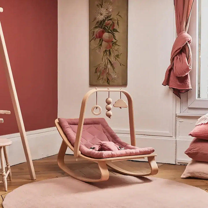Charlie Crane LEVO Rocker | Beech Bois de Rose featured as an elegant baby rocker chair for nursery room furniture