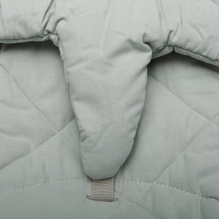 Textile and wood detail on the Charlie Crane LEVO Rocker | Beech Farrow for refined nursery furniture