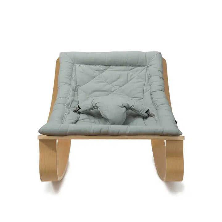 Front-facing view of the Charlie Crane LEVO Rocker | Beech Farrow styled as a timeless baby rocking chair