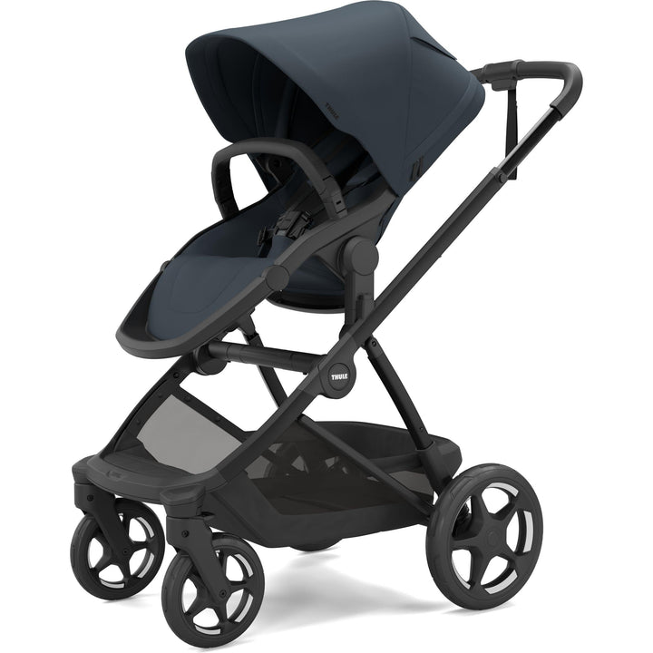 Thule Charm Stroller in Darkest blue on black, stroller seat, three-quarter view | full-size stroller from birth