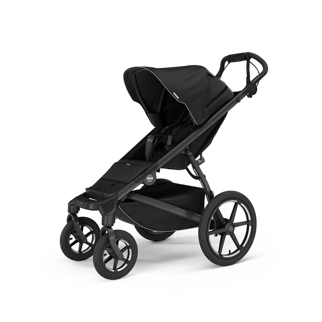 Thule Urban Glide stroller in soft beige, a versatile option for strolling and jogging.