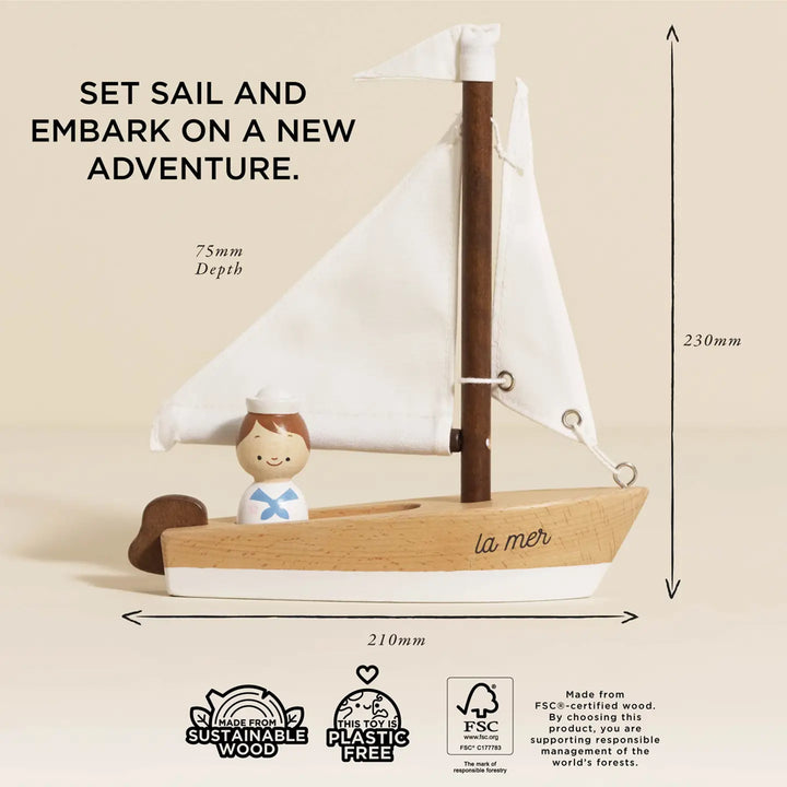 Le Toy Van Sailing boat with captain, a wooden vehicle toy that encourages creative maritime adventures for children.