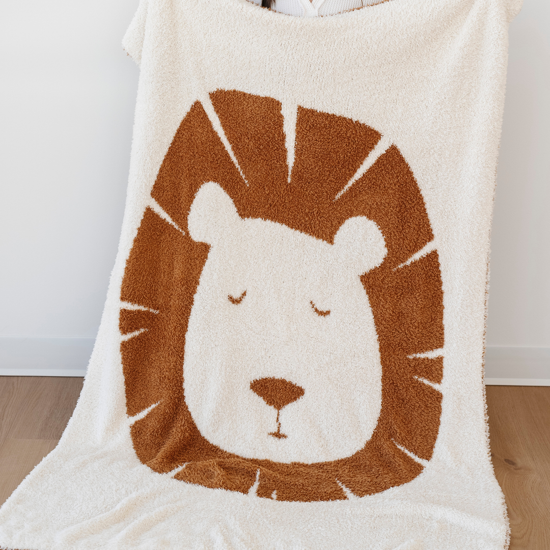 The Lion Saranoni Double-Layer BAMBONI¨ Mini Blanket delivers irresistible comfort, ranking high among the best baby blankets.