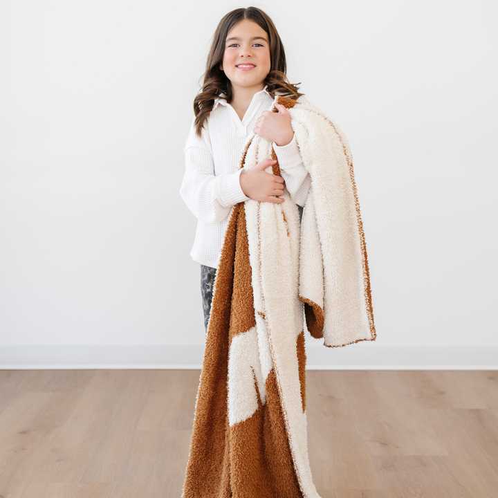 Saranoni BAMBONI¨ Receiving Blanket in Lion adds a playful touch to cozy infant receiving blankets.