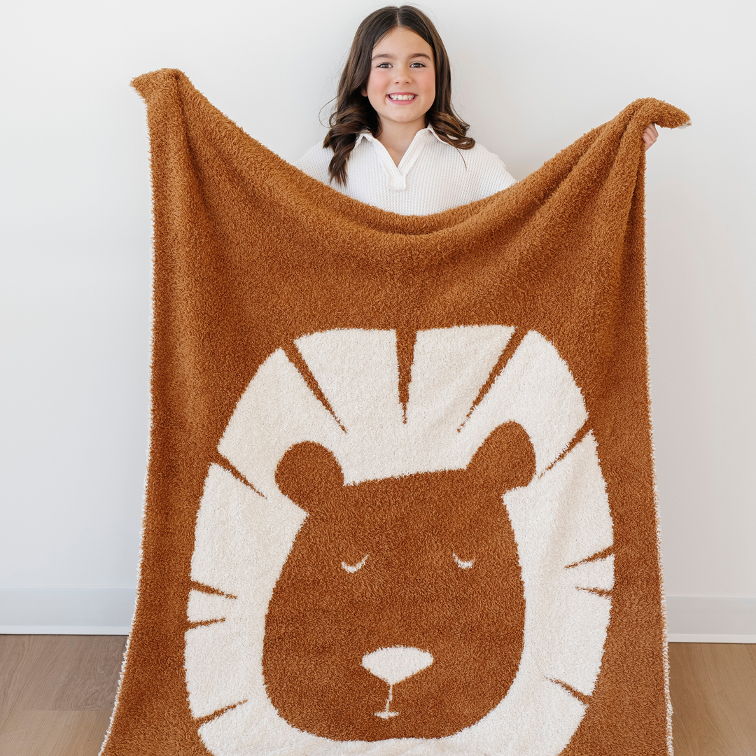 Soft and inviting, the Saranoni BAMBONI¨ Receiving Blanket in Lion is one of the best baby blankets for gifting.