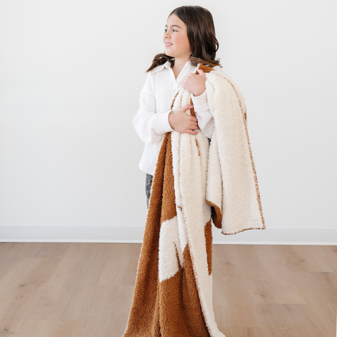 Keep your baby snug with the Saranoni BAMBONI¨ Receiving Blanket in Lion, a must-have newborn receiving blanket.