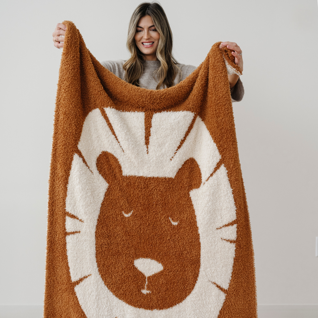 The warm Lion Saranoni Double-Layer BAMBONI¨ Toddler Blankets design feels buttery smooth like soft baby blankets.