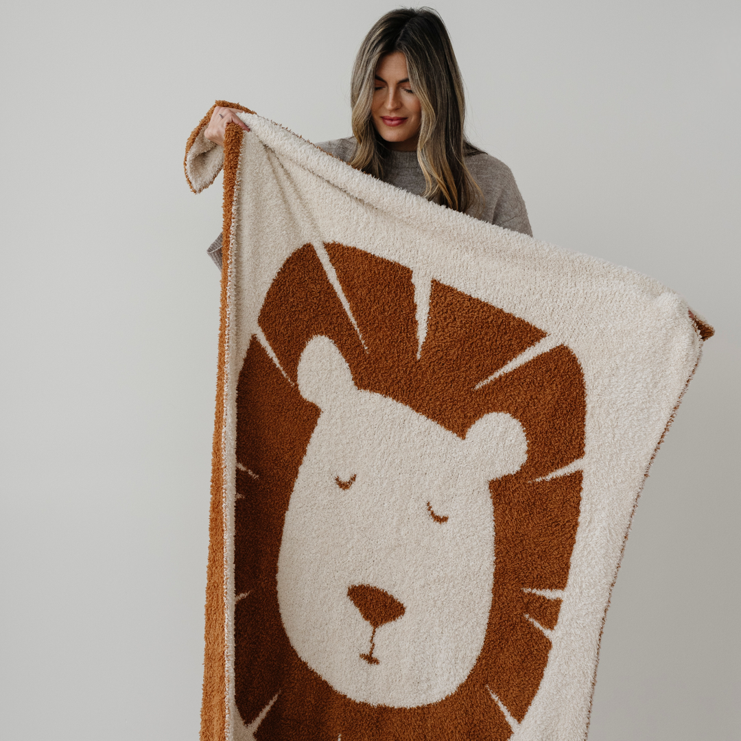 Saranoni Double-Layer BAMBONI¨ Toddler Blankets in Lion Golden Tan brings playful cozy vibes perfect for a toddler blanket.
