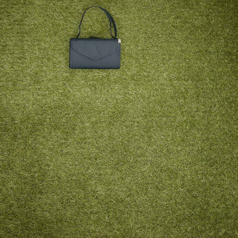 Outdoor setup with Little Unicorn Midnight Poppy blanket, premium outdoor throw blanket for any adventure