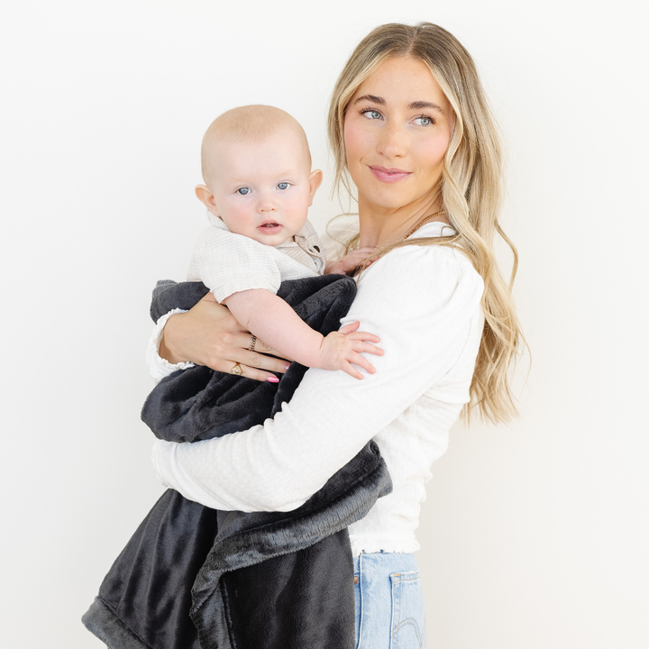 Charcoal Saranoni Lush Mini Blanket brings a warm feminine look that works beautifully for Baby girl blankets.