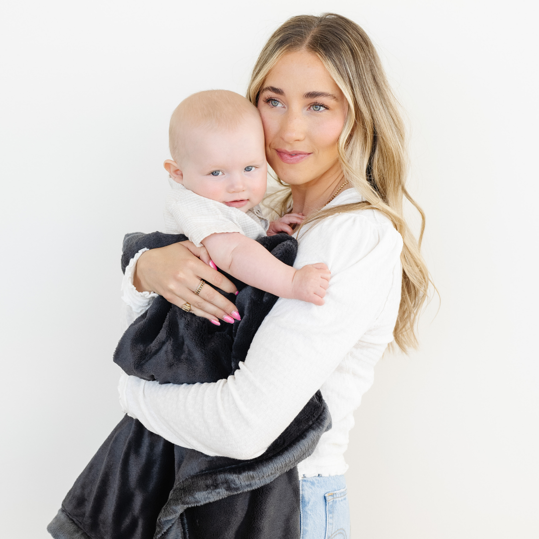 Cozy comfort is maximized with the Saranoni Lush Mini Blanket in Charcoal, perfect for Baby boy blankets.