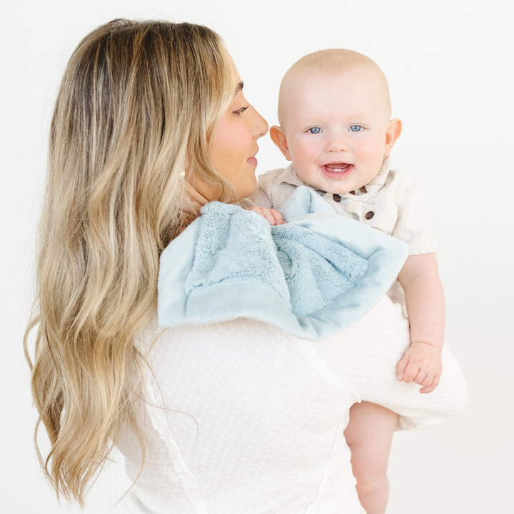 Dew from the Saranoni Lush Mini Blanket lineup offers luxe comfort levels parents rely on in baby blankets.