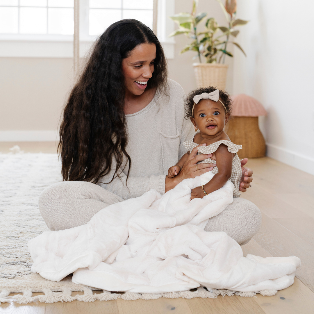 Wrap your baby in Natural Lush Receiving Blanket by Saranoni, plush and comforting as a baby boy blanket.
