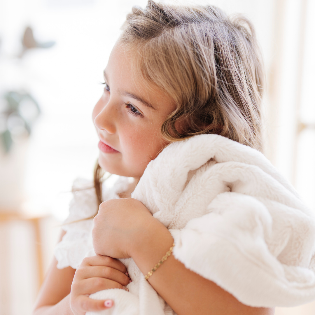 Natural gives this Saranoni Lush Toddler Blanket a refined texture parents love for baby blankets.