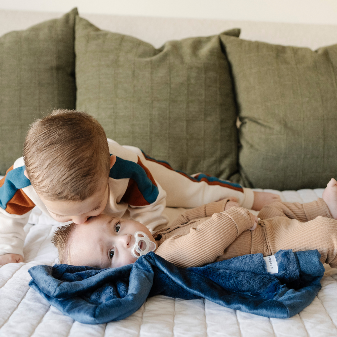 Saranoni Navy Lush Mini Blanket feels velvety in hand, delivering signature softness in soft baby blankets form.