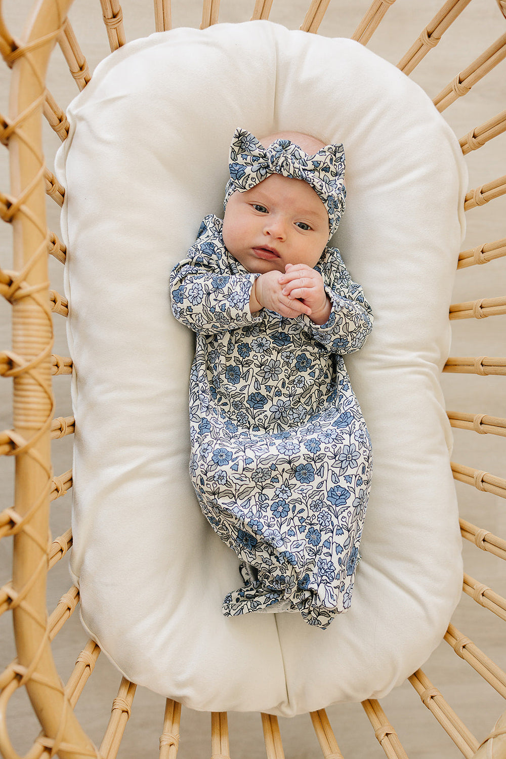 With delicate pointelle fabric, the Mebie Baby Bluebell Bamboo Knot Gown works beautifully as bamboo baby pajamas for newborns