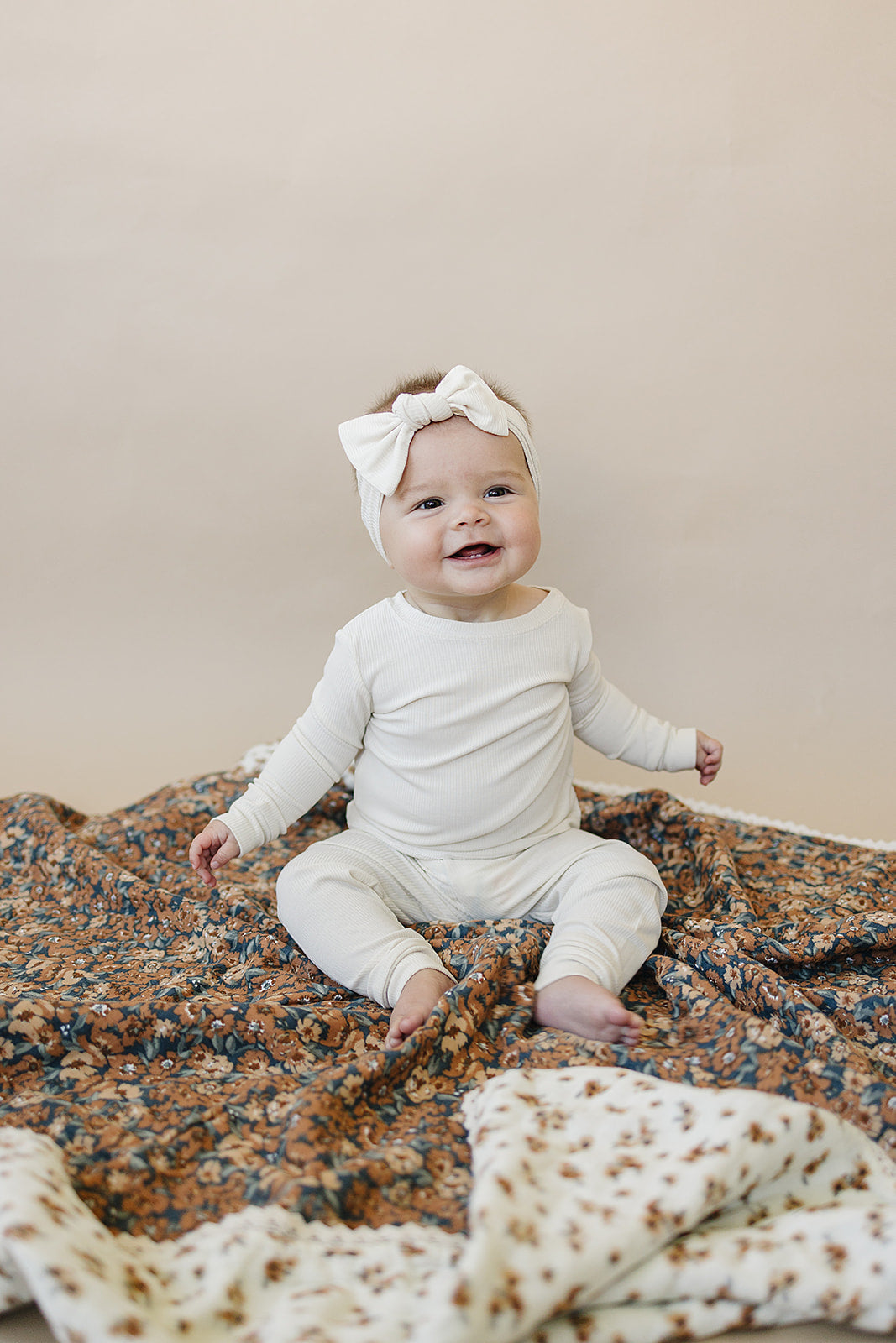 Mebie Baby Venetian Floral + Autumn Bloom Lace Muslin Quilt provides gentle comfort as a breathable muslin.