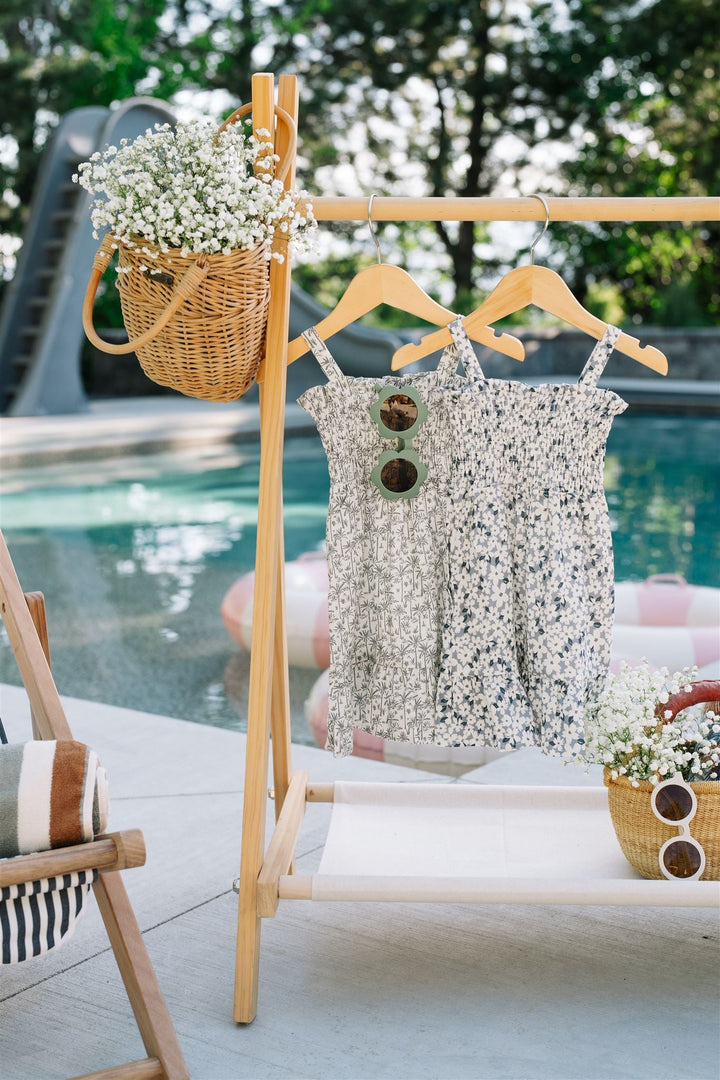 Mebie Baby Palm Tree Linen Dress photographed in natural light to show true color