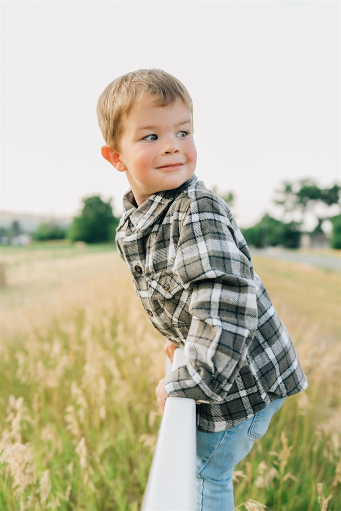 Toddler wearing the Mebie Baby charcoal flannel shacket button down jacket shirt with collar coat for babies and toddlers