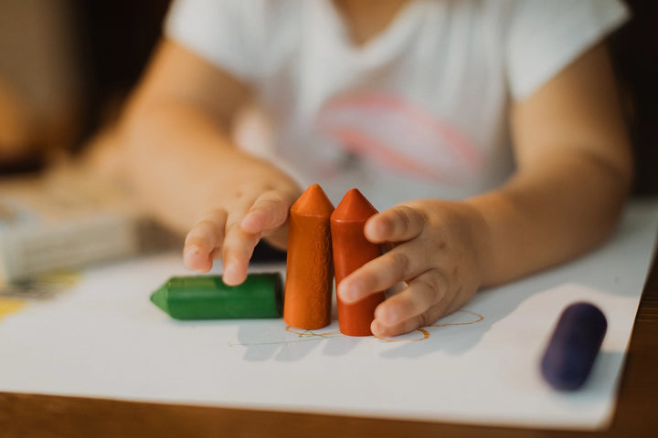 Handmade Mendenka Junior Crayons, safe beeswax crayons that encourage creativity and fine motor skills in young children.