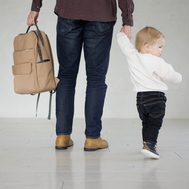 Little Unicorn Red Rovr Roo Backpack - Toffee in action, a fun and sturdy little kids backpack designed for on-the-go families.