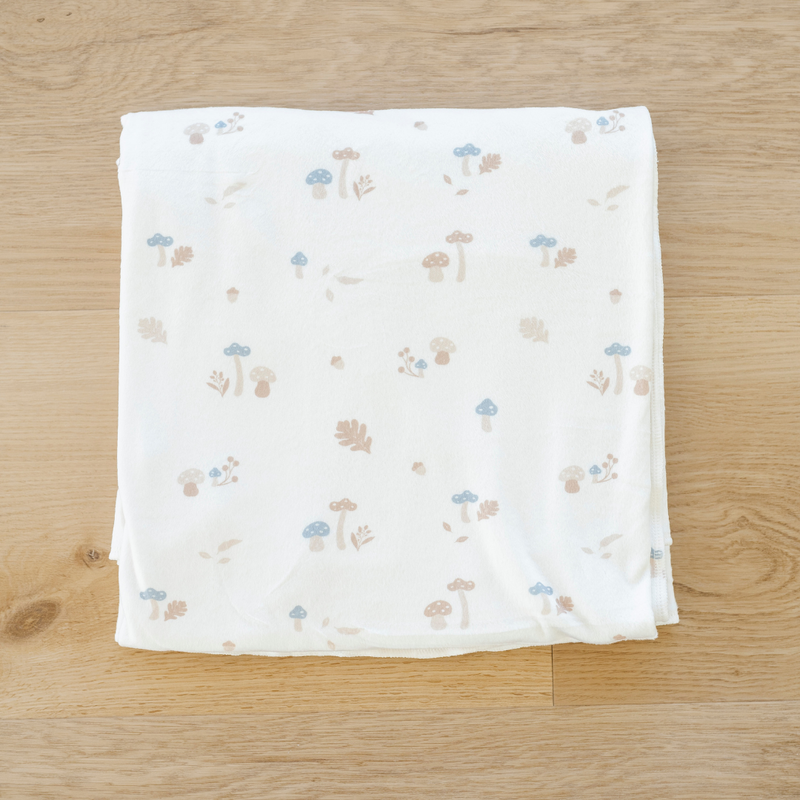 The Saranoni Minky Stretch Luxe Swaddle/Blanket in Mushroom provides supportive stretch and functions well as a baby blanket staple.