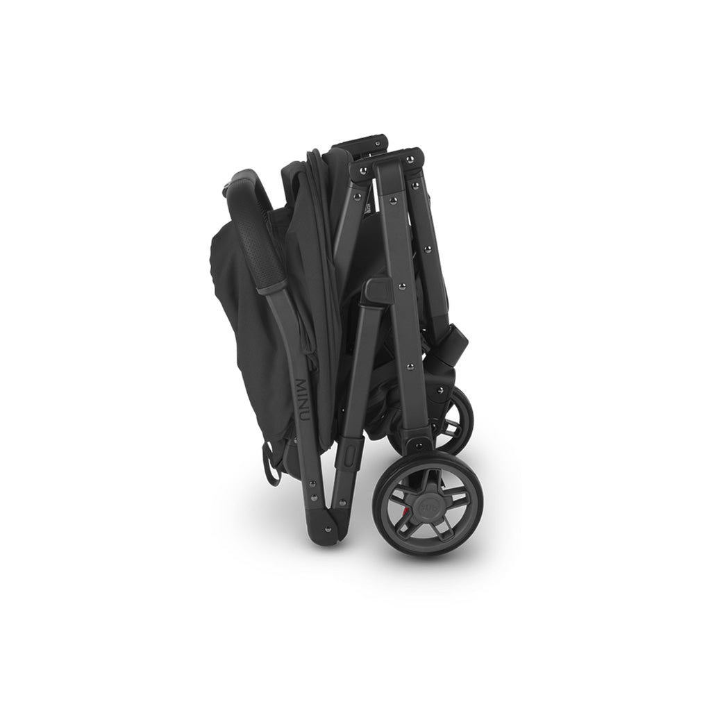 Side view of folded Uppababy stroller Minu V2 in Jake
