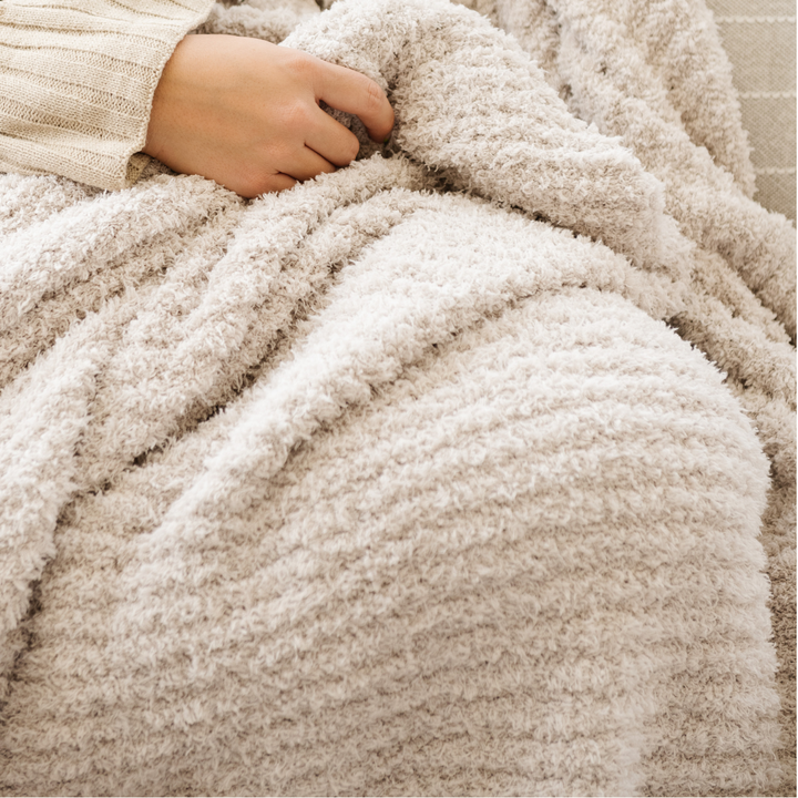 Parents who want a Baby boy blanket will appreciate the Moonbeam Saranoni Ribbed BAMBONI¨ Throw Blanket.