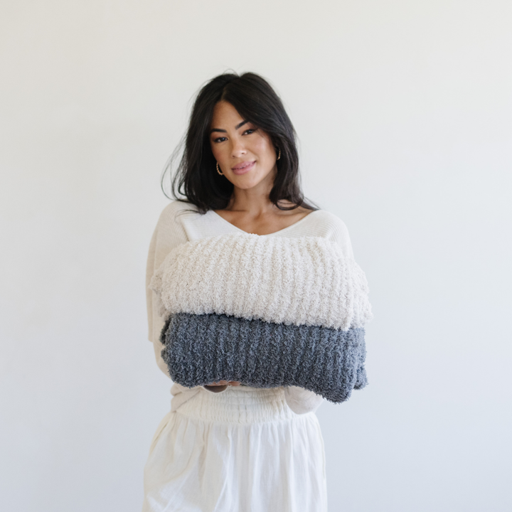 Soft baby blankets lovers will instantly connect with the rich comfort of the Moonbeam Saranoni Ribbed BAMBONI¨ Throw Blanket.