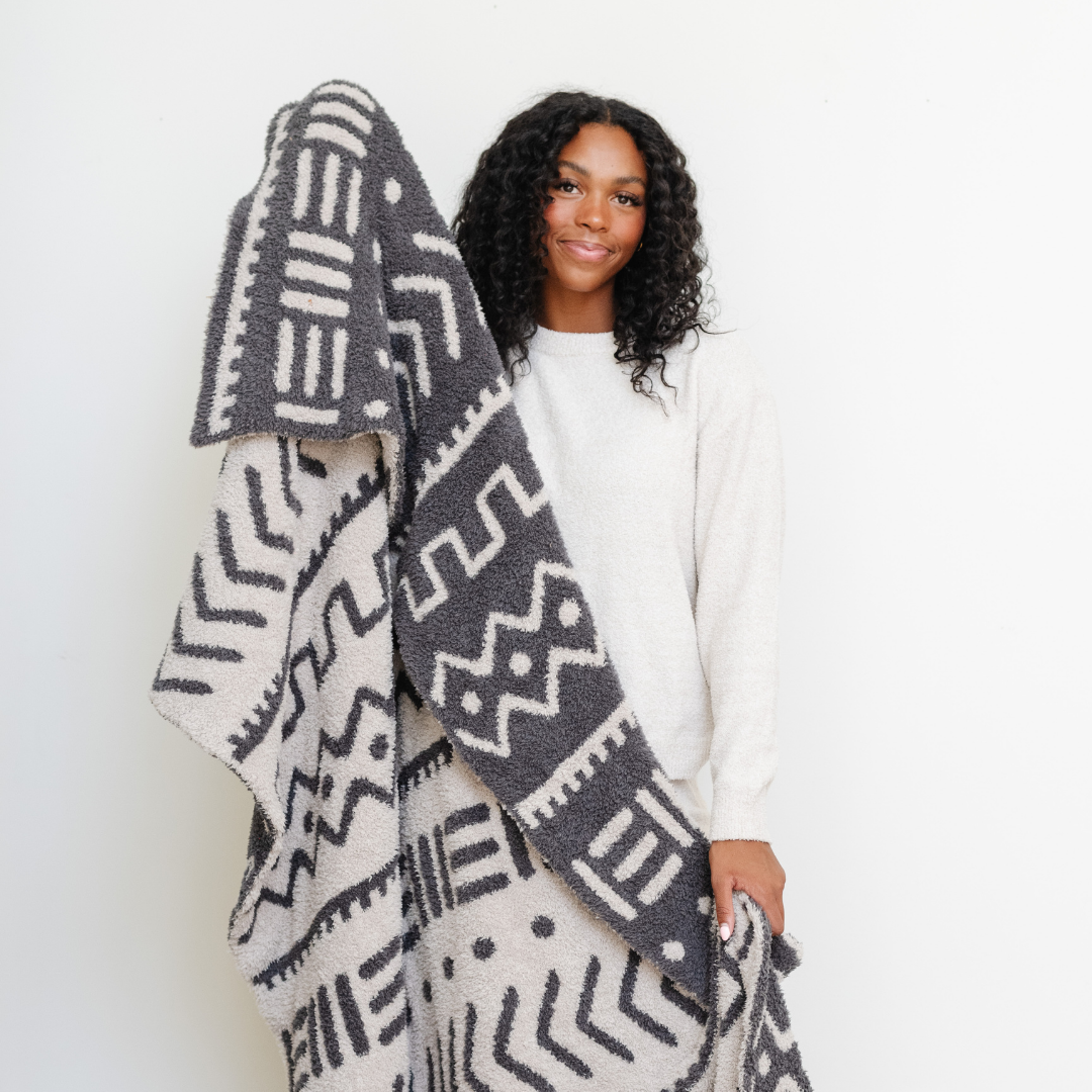 Crafted for texture and charm, the Mudcloth Saranoni Double-Layer BAMONI¨ Throw Blanket offers unbeatable coziness among toddler blankets.