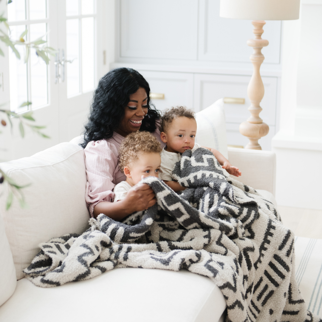 Add warmth to any room with the Saranoni Double-Layer BAMONI¨ Throw Blanket in Mudcloth Neutral Ñ a timeless choice for baby blankets.