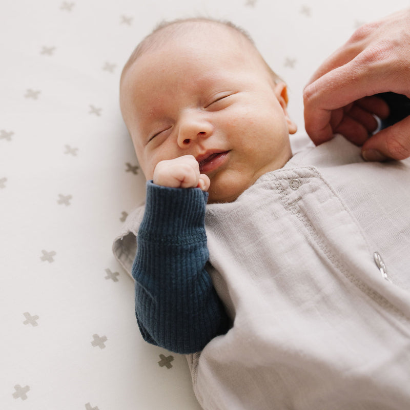 Close-up of Little Unicorn Cotton Muslin Sleep Bag - Porpoise, sleeping bag baby with quilted design.