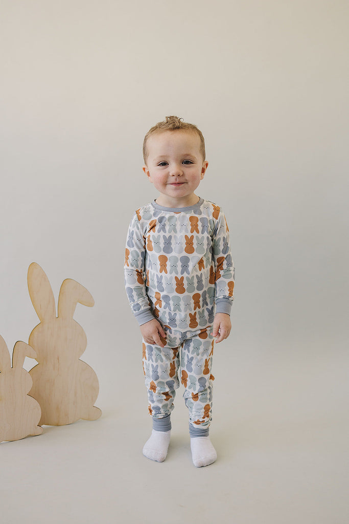 Kid wearing the dusty blue bunny bamboo set by Mebie Baby