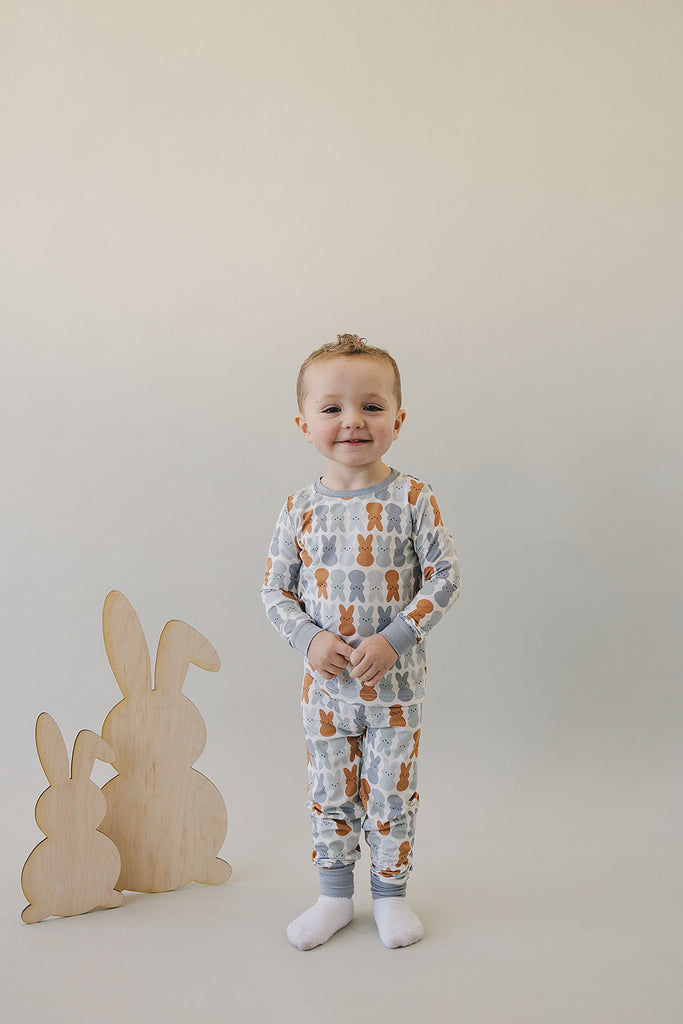 Little kid in the Mebie baby organic bamboo dusty blue set