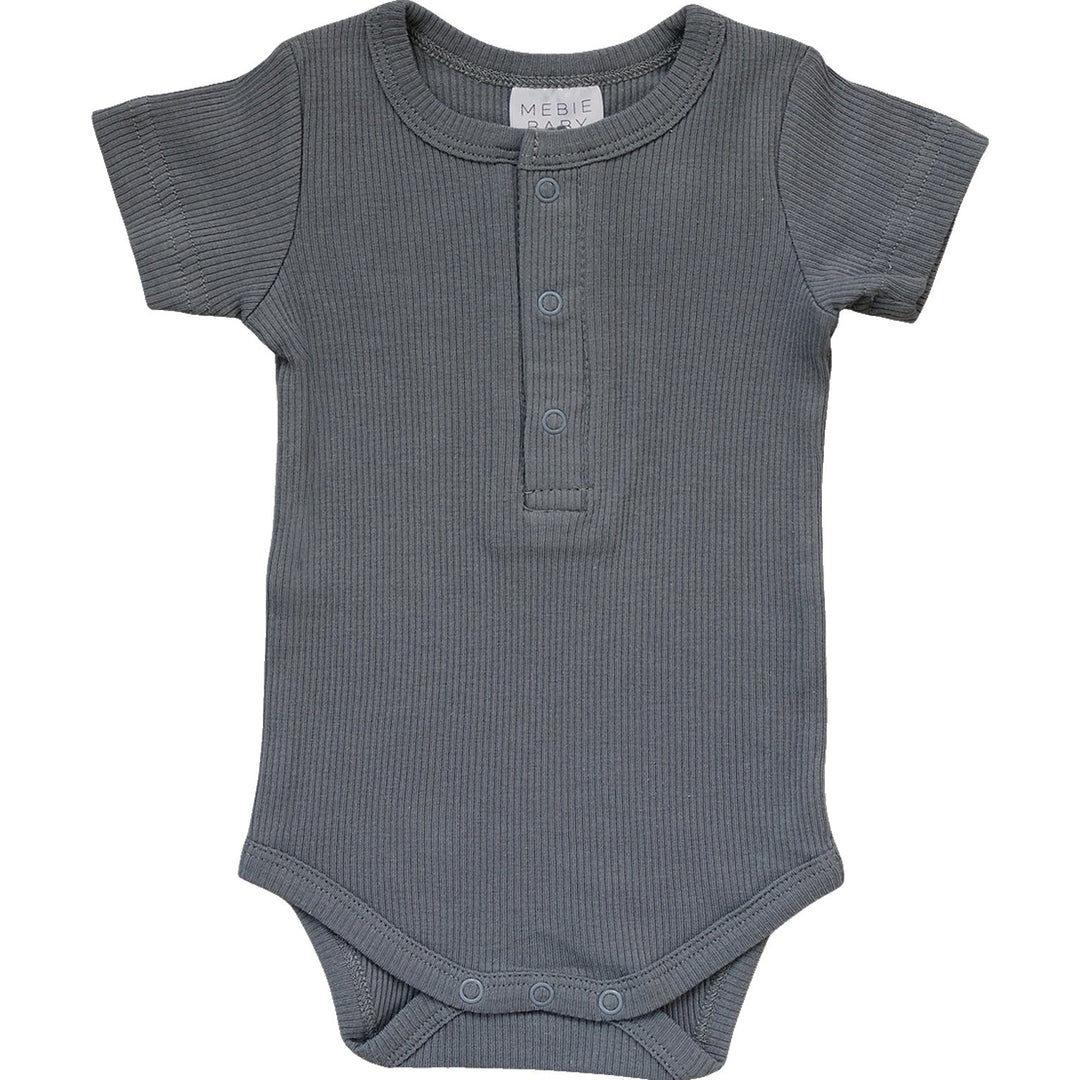 Grey Organic Cotton Ribbed Snap Bodysuit by Mebie Baby, worn by a crawling baby.