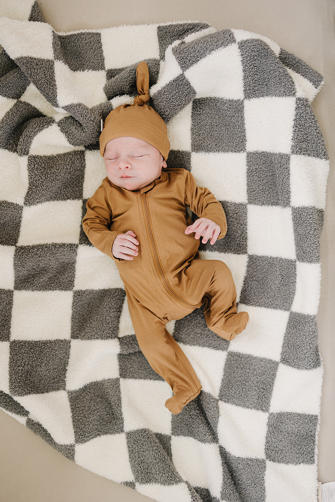 Mustard Bamboo Footed Zipper shown from a different angle to highlight this footed baby pajama