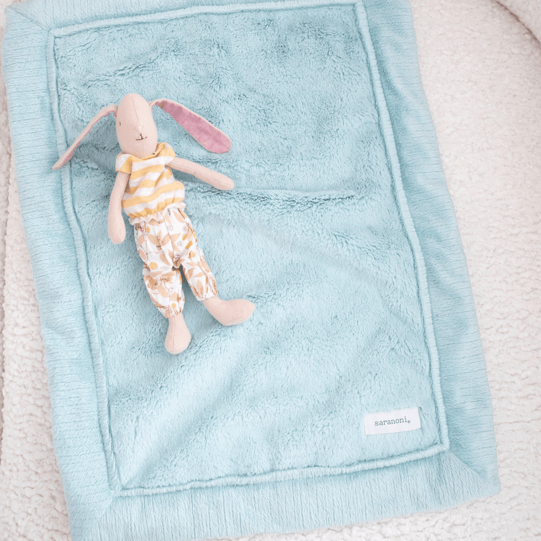 Soft, warm, and ultra plush, the Saranoni Lush Mini Blanket in Dew is a must-have best baby blanket essential.