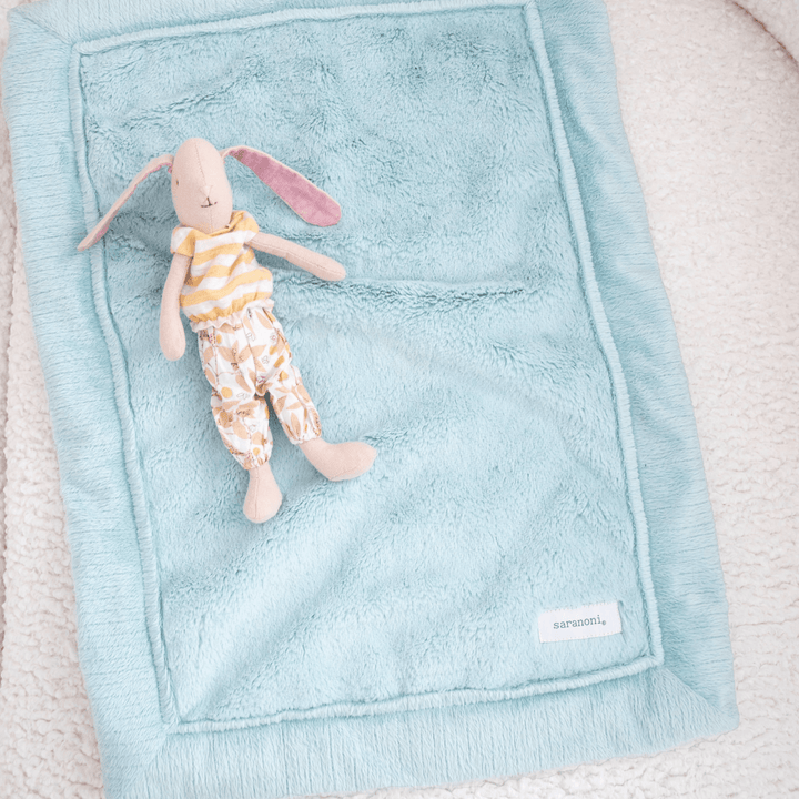 Soft, warm, and ultra plush, the Saranoni Lush Mini Blanket in Dew is a must-have best baby blanket essential.