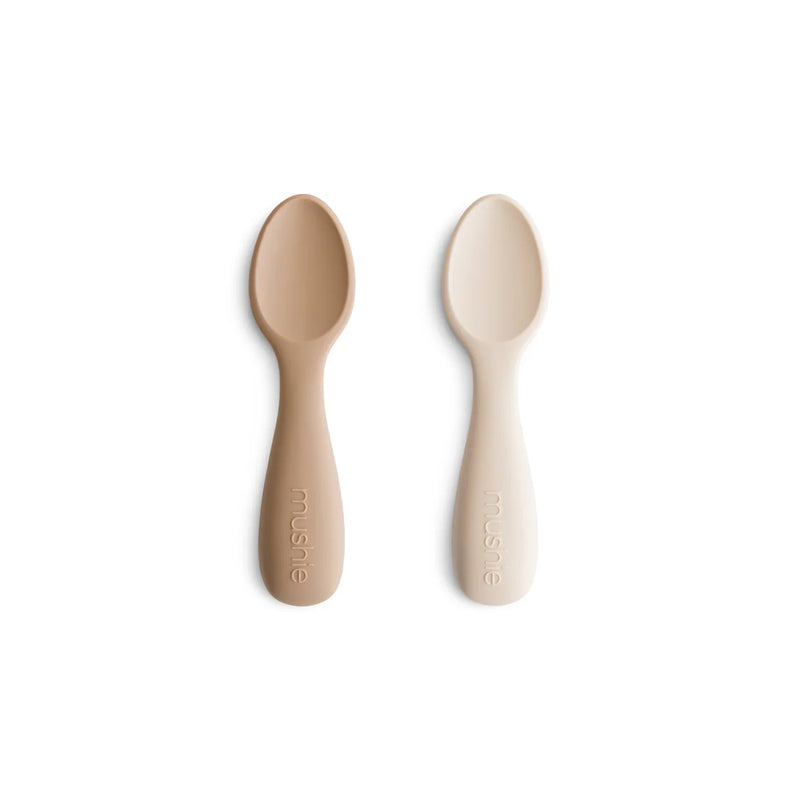 Mushie Toddler Starter Spoons featuring soft ergonomic handles for comfortable use during mealtime