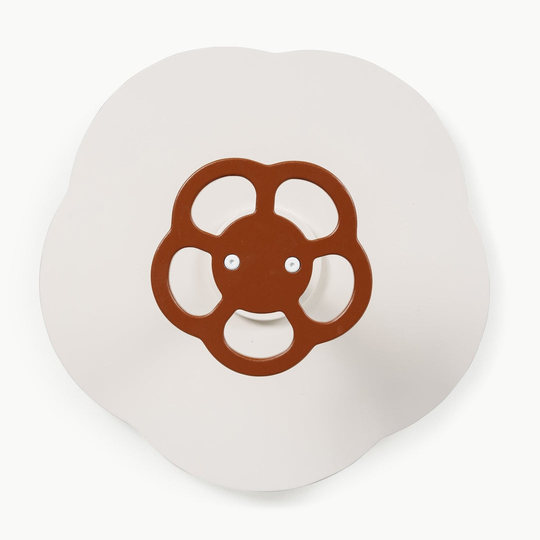 Close up of the rust colored wheel handle featured on Gathre's Sit and Spin