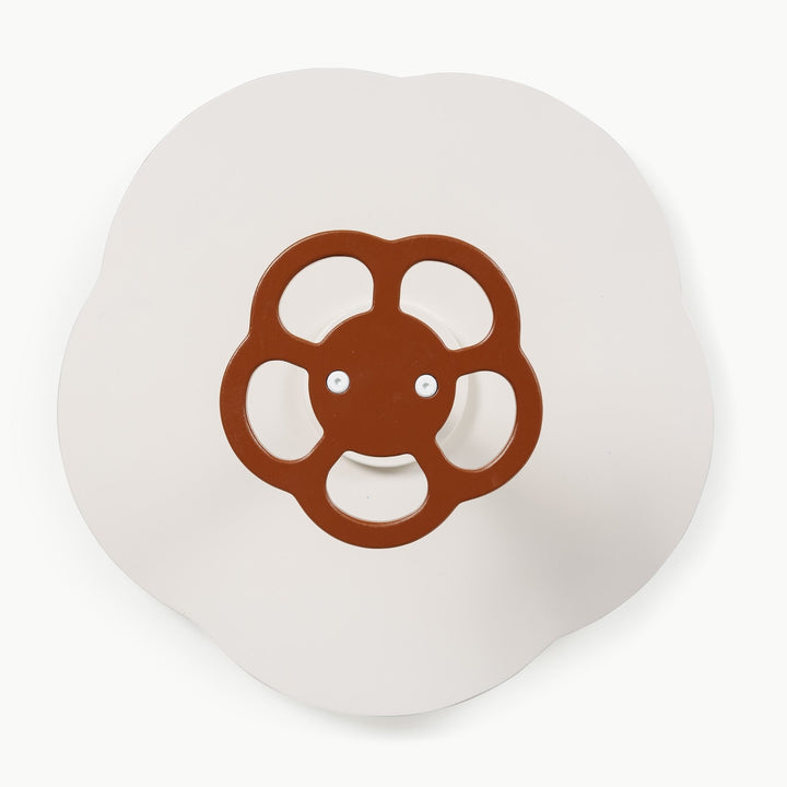 Close up of the rust colored wheel handle featured on Gathre's Sit and Spin