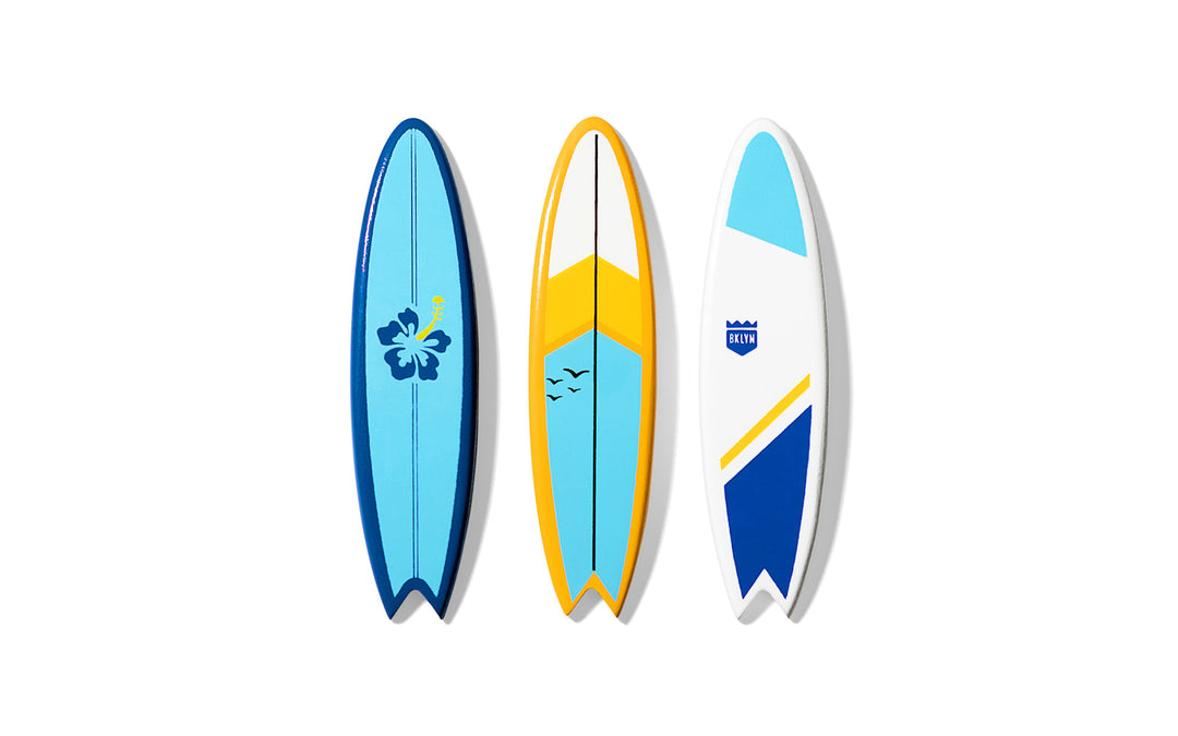 Flat view of Plantoys Teal Santa Monica, a wooden toy perfect for creative play.