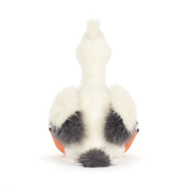 Jellycat Keli Pelican seated lifestyle shot – unique coastal bird stuffed animal gift for ocean lovers and Jellycat collectors