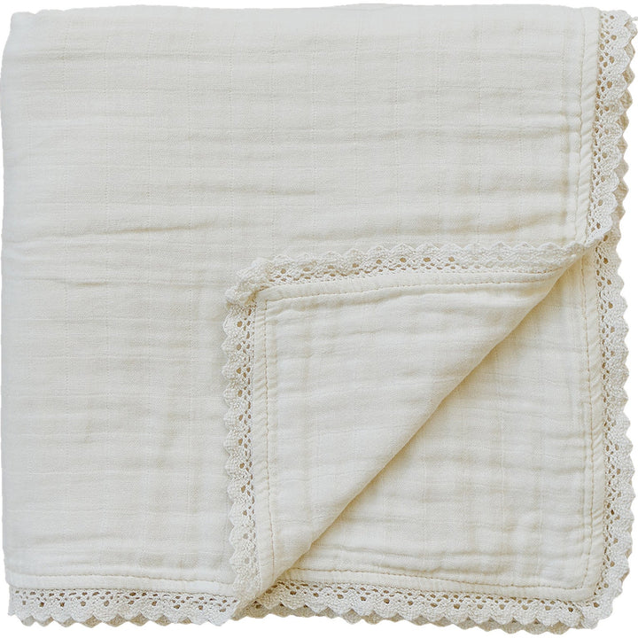Creamy and soft, the Mebie Baby Cream Lace Muslin Quilt is a perfect muslin baby blanket for cozy naps.