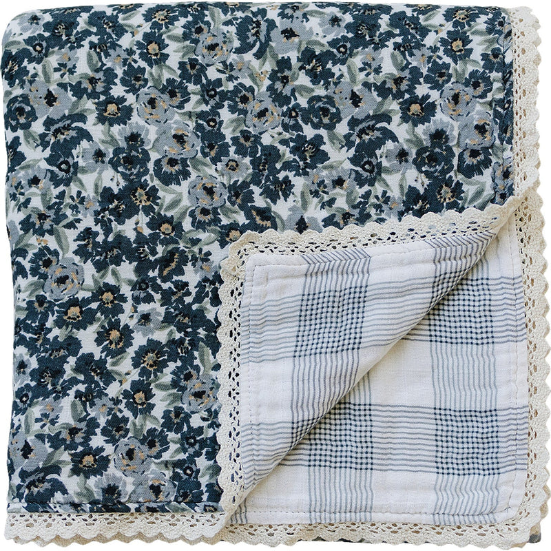 Soft and cozy, the Liberty Floral + Coastal Plaid Lace Muslin Quilt by Mebie Baby is a gentle muslin baby blanket.