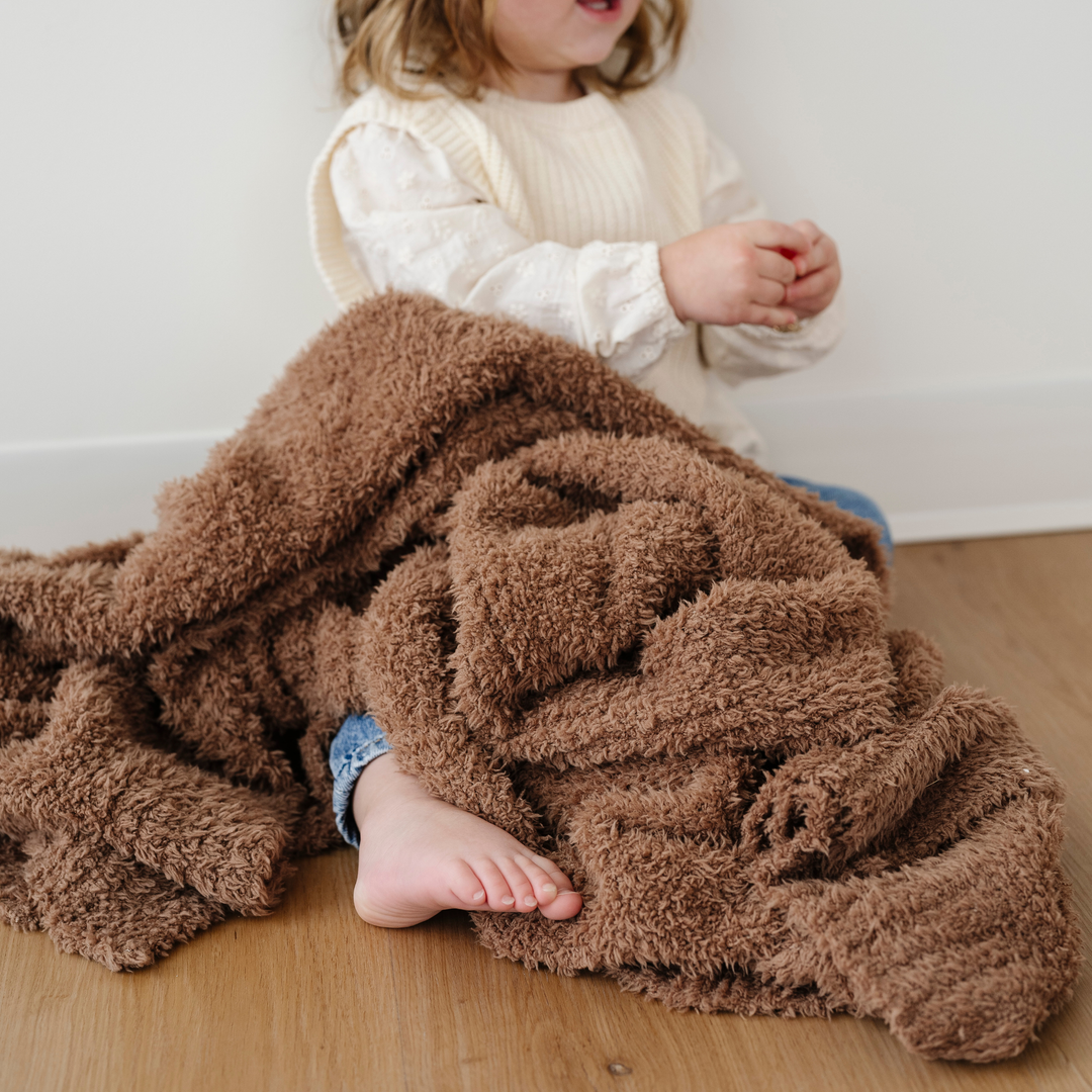 Warm and timeless, the Saranoni BAMBONI¨ Receiving Blanket in Pecan is a beautifully soft baby blanket for everyday use.