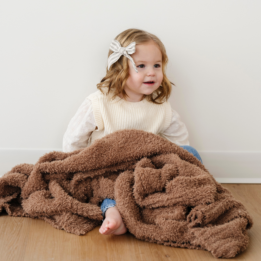 SaranoniÕs BAMBONI¨ Receiving Blanket in Pecan is designed for ultimate comfort, one of the best baby blankets available.