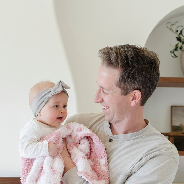 With its gentle Petal hue, the Saranoni Double-Layer BAMBONI¨ Mini Blanket brings a soft, soothing touch Ñ the best baby blanket for snuggles.