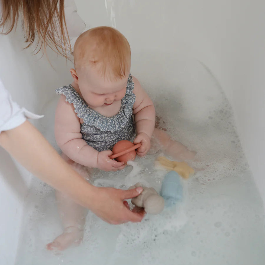 The best bath toys by Mushie featuring space-themed designs for engaging toddlers while keeping them mold-free