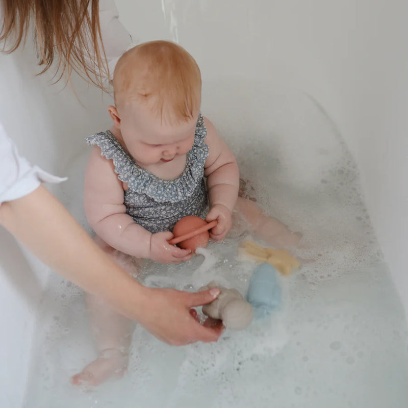 The best bath toys by Mushie featuring space-themed designs for engaging toddlers while keeping them mold-free